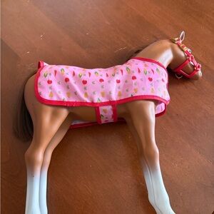 Pink and Brown Toy Horse with Blanket